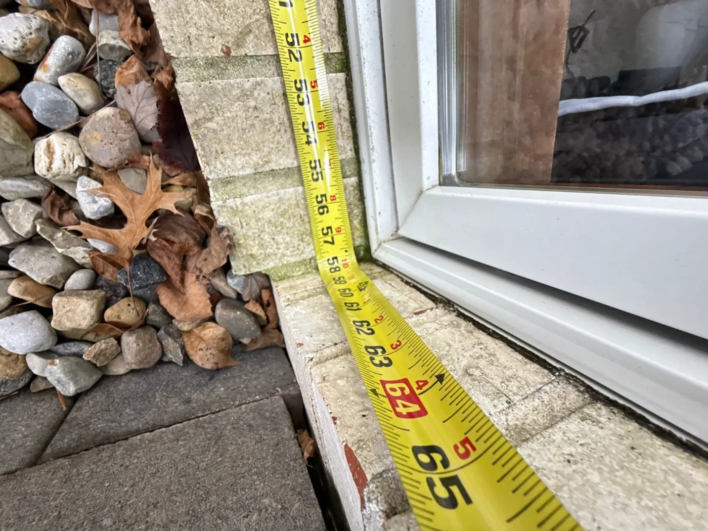 Storm-damaged window documented in Pittsboro